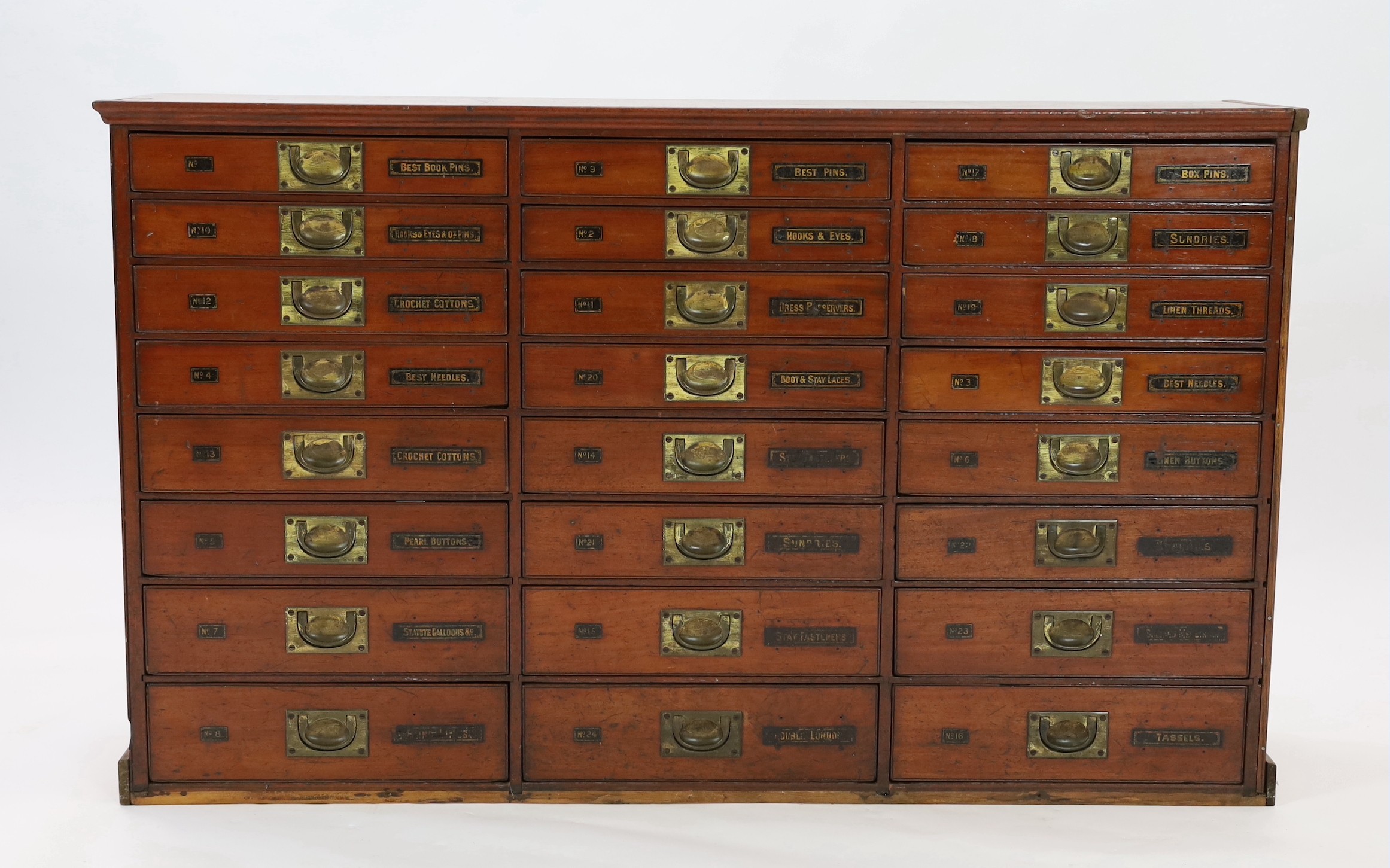 A Victorian mahogany haberdashery cabinet of twenty four drawers, width 136cm depth 35cm height 82cm